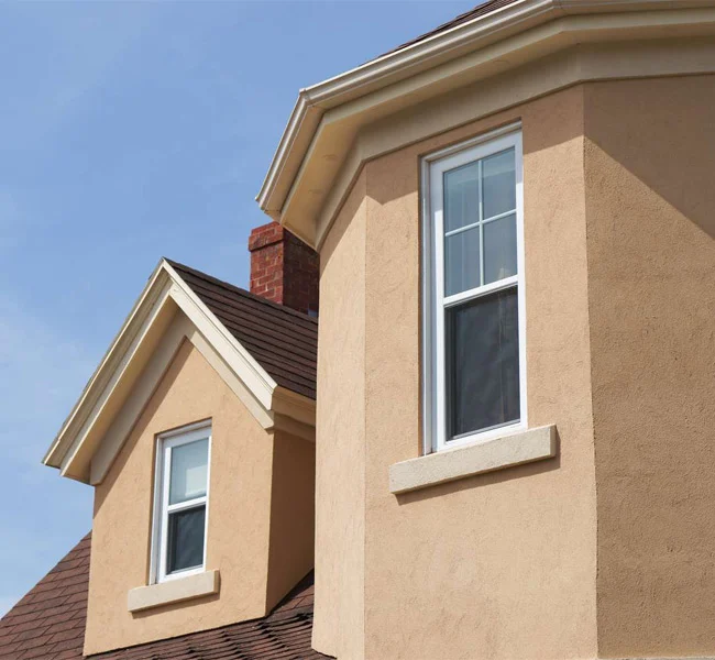 Brickface stucco coating replicating traditional brick